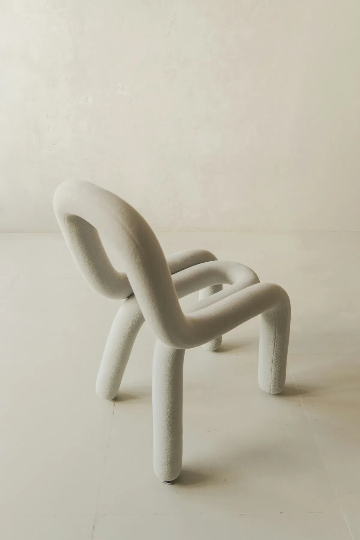 Sculptural ivory lounge chair from the furniture collection